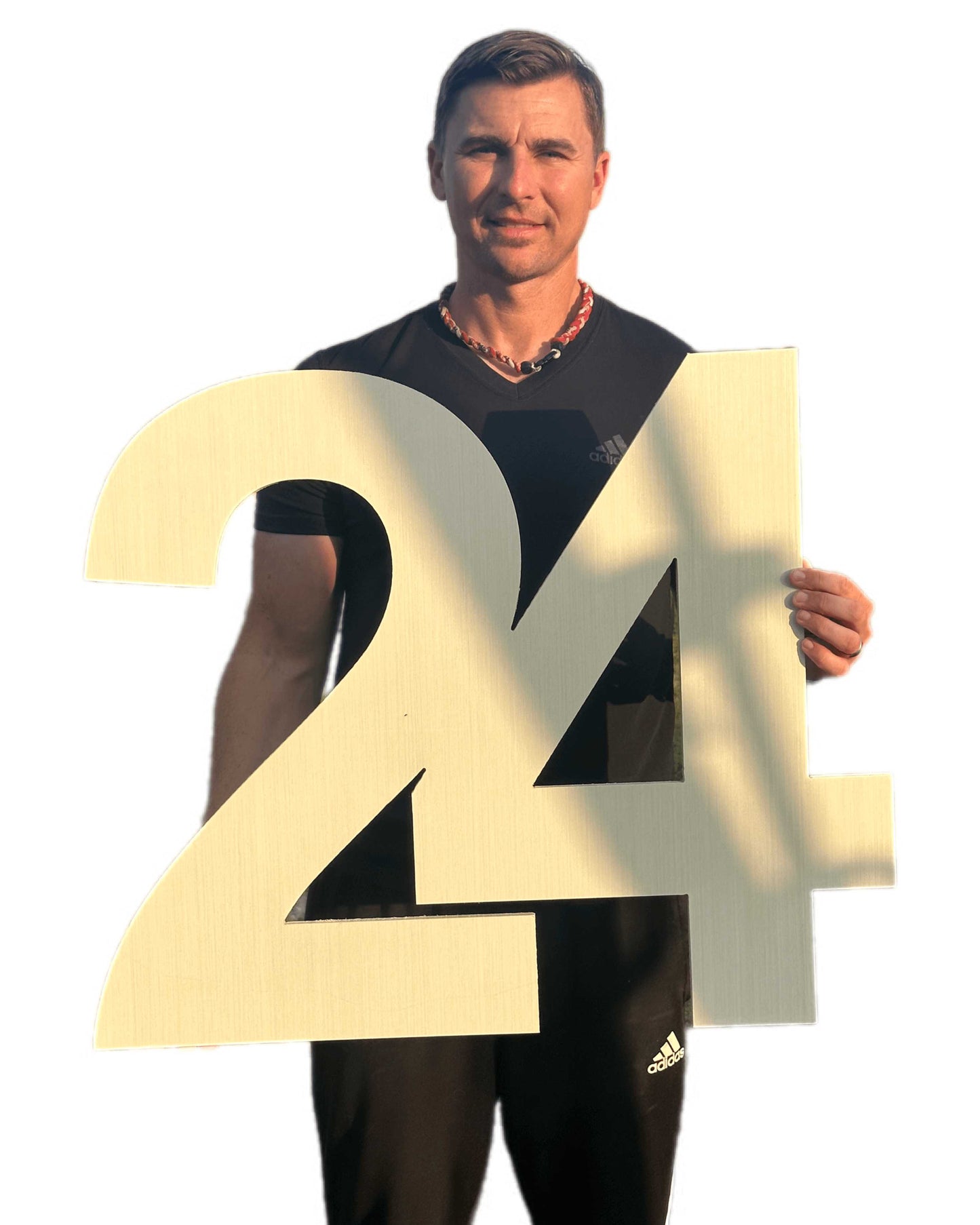 unpainted 24 inch 24 photo prop (comes with stand). Handsome man in black holds the wooden numbers.