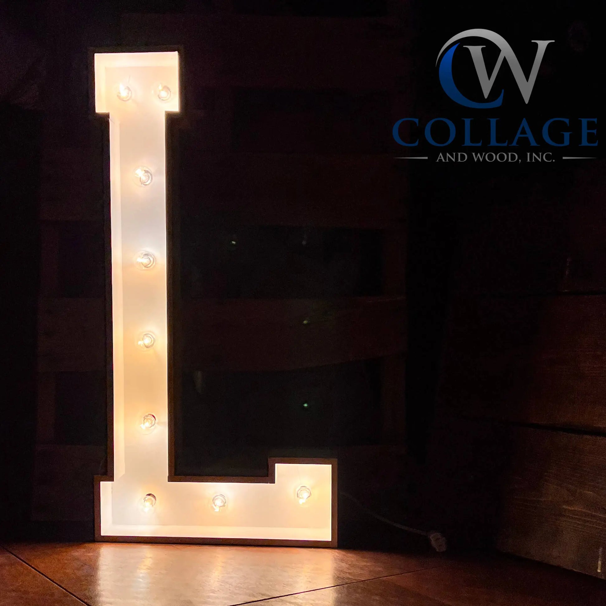 Luxurious wooden marquee letter L, stretching 3 feet tall, finished in a pure white hue, lit by dazzling LED lights.