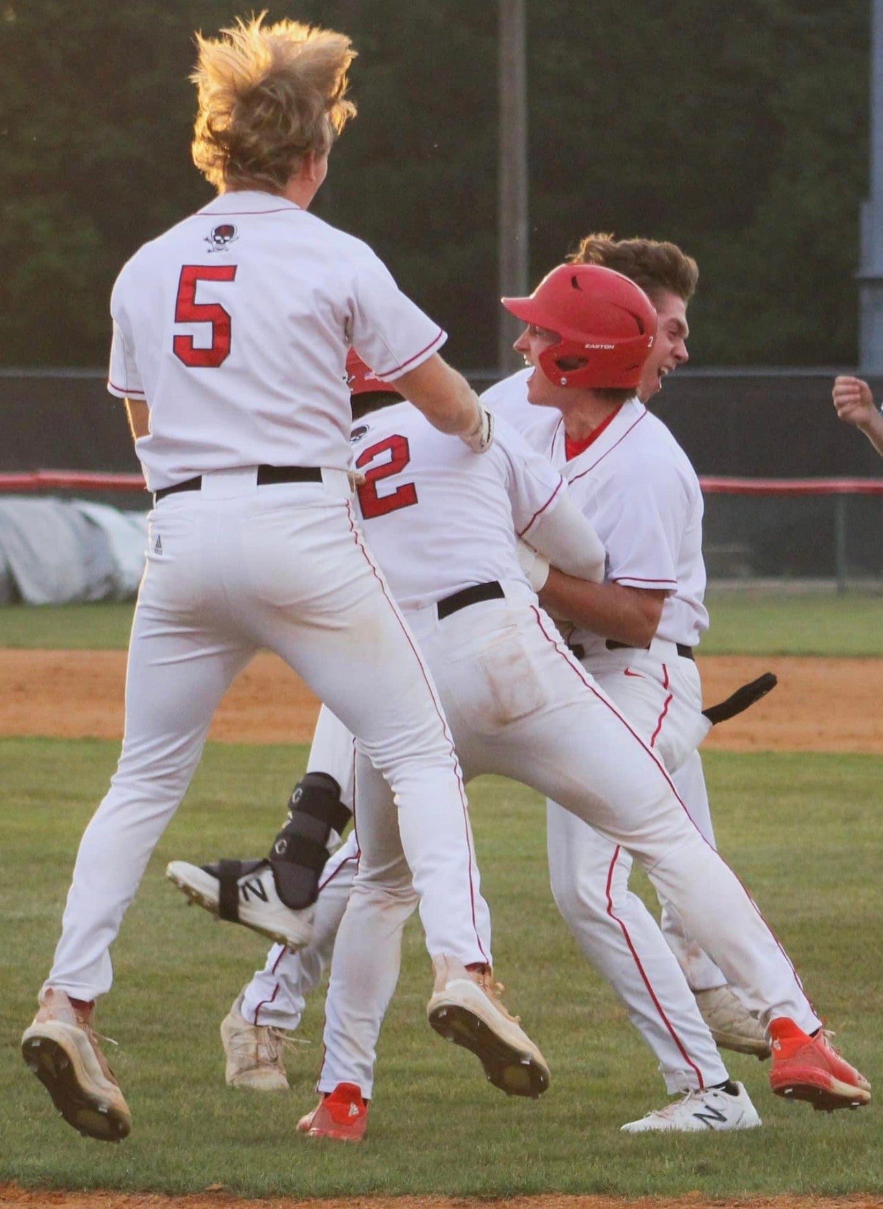 baseball teammates after a home run | Collage and Wood