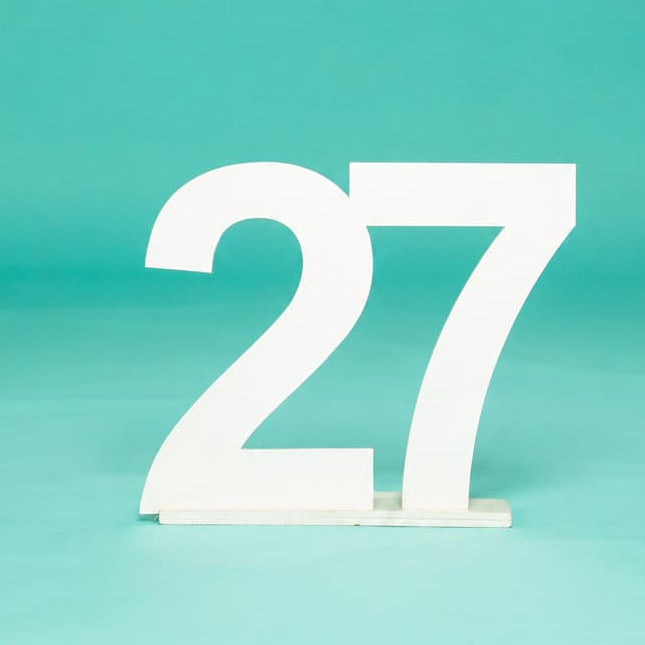 White number '27' photo prop on a teal background from collageandwood.com.