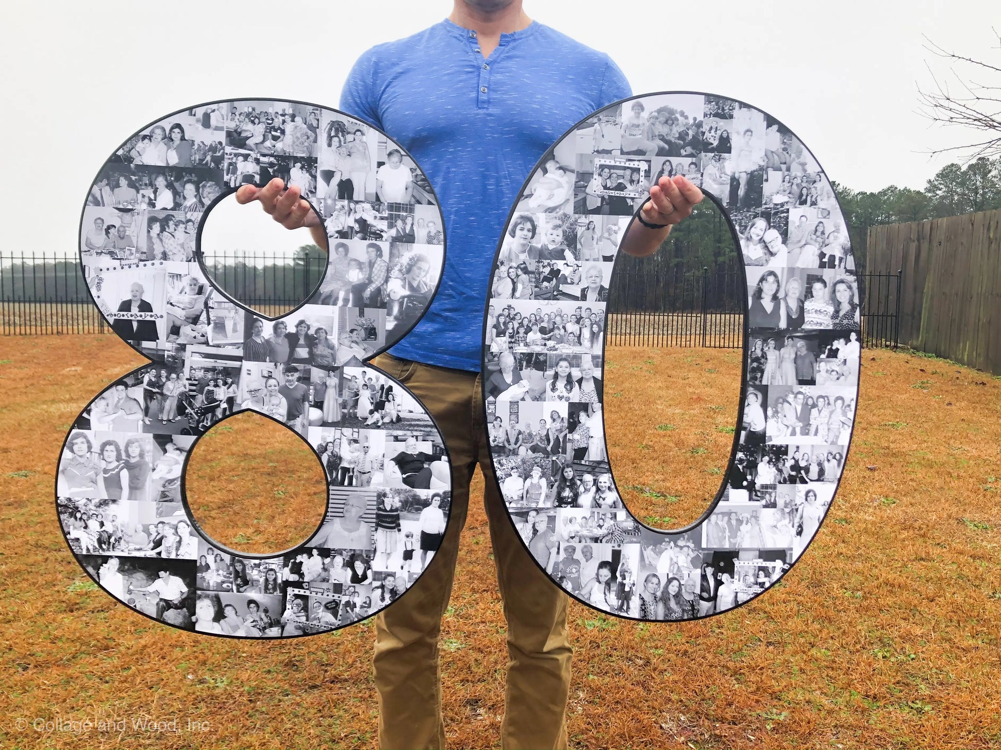 A person holds a large black-and-white photo collage shaped like the number '80' outdoors, filled with cherished family memories to celebrate a special milestone birthday. To celebrate 80 years of life. gift the ultimate gift: 80th birthday collage from collageandwood.com.