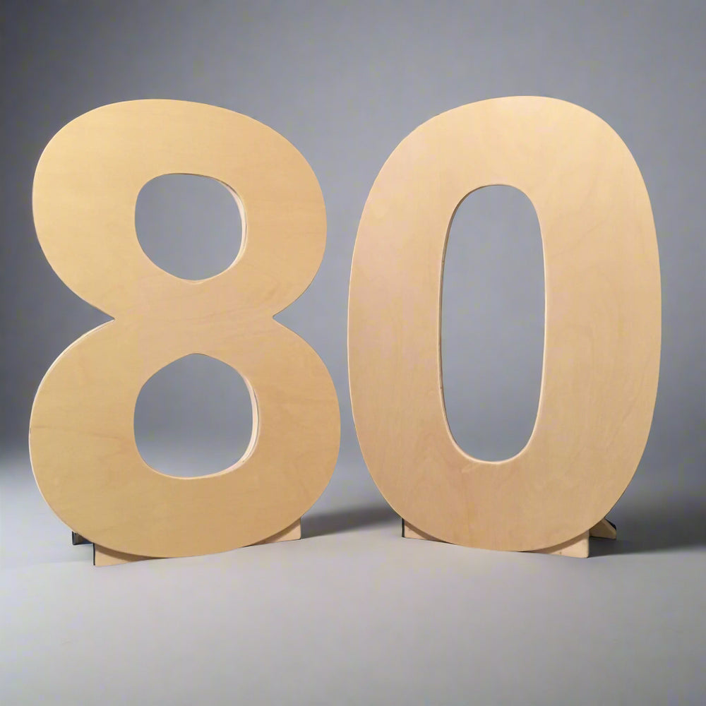 Large unfinished wooden numbers '80' standing upright on a neutral background, ready for customization or decoration. Available at collageandwood.com.