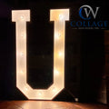 U - Unforgettable 3-foot tall wooden marquee letter U, painted in a fresh white hue, featuring brilliant battery-powered LED lights.