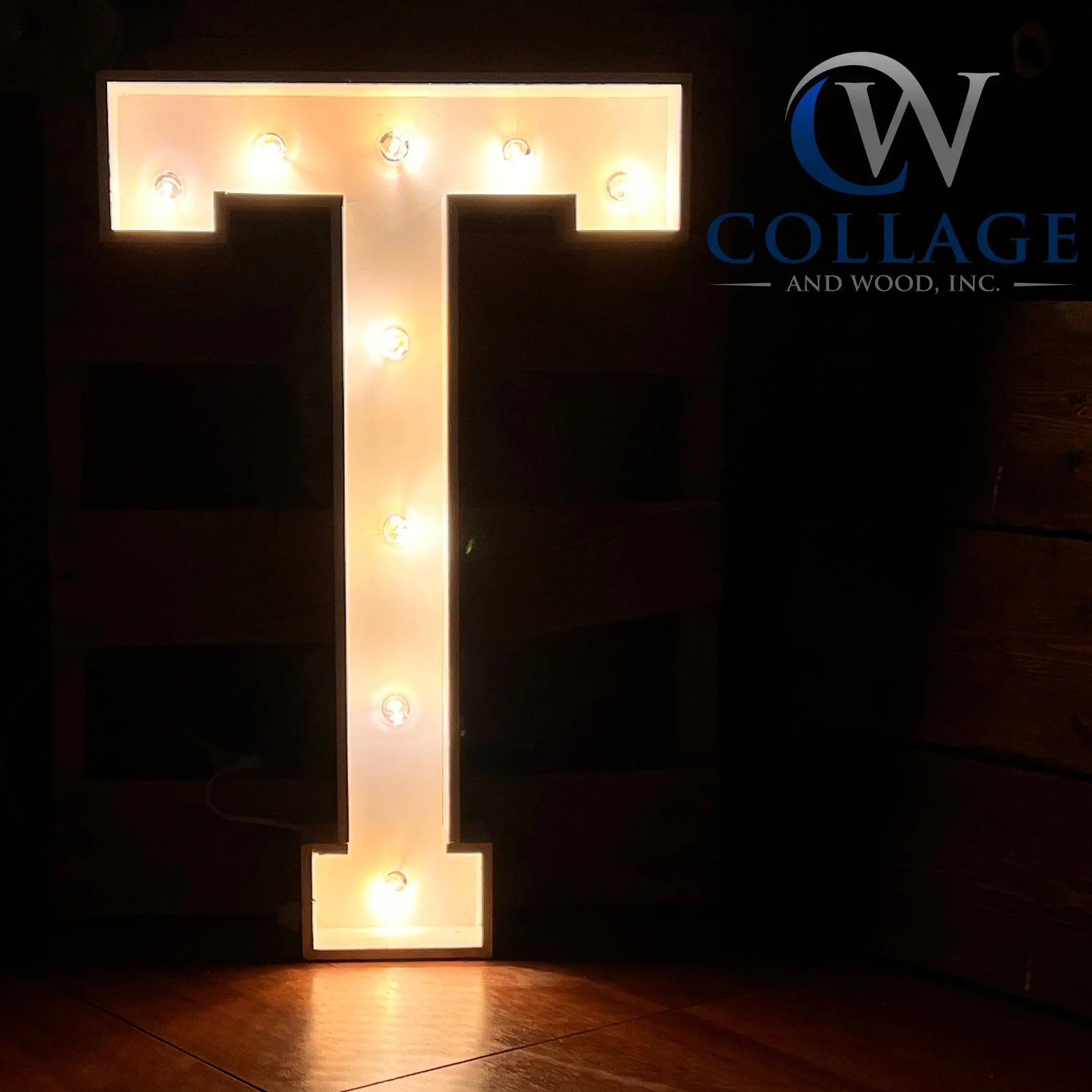 Timeless wooden marquee letter T, standing tall at 3 feet, in a sleek white finish, glowing with dazzling LED lights.
