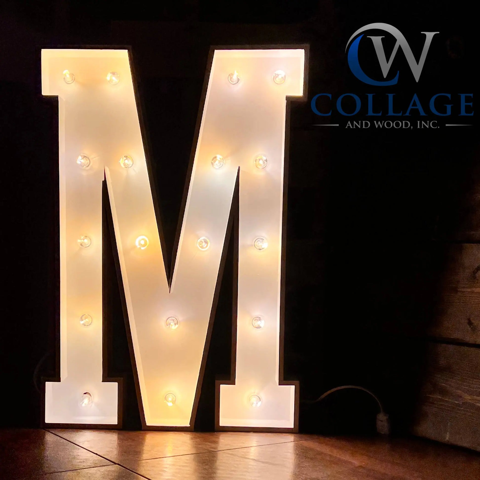 Majestic 3-foot tall wooden marquee letter M, elegantly dressed in white, adorned with brilliant battery-powered LED lights.