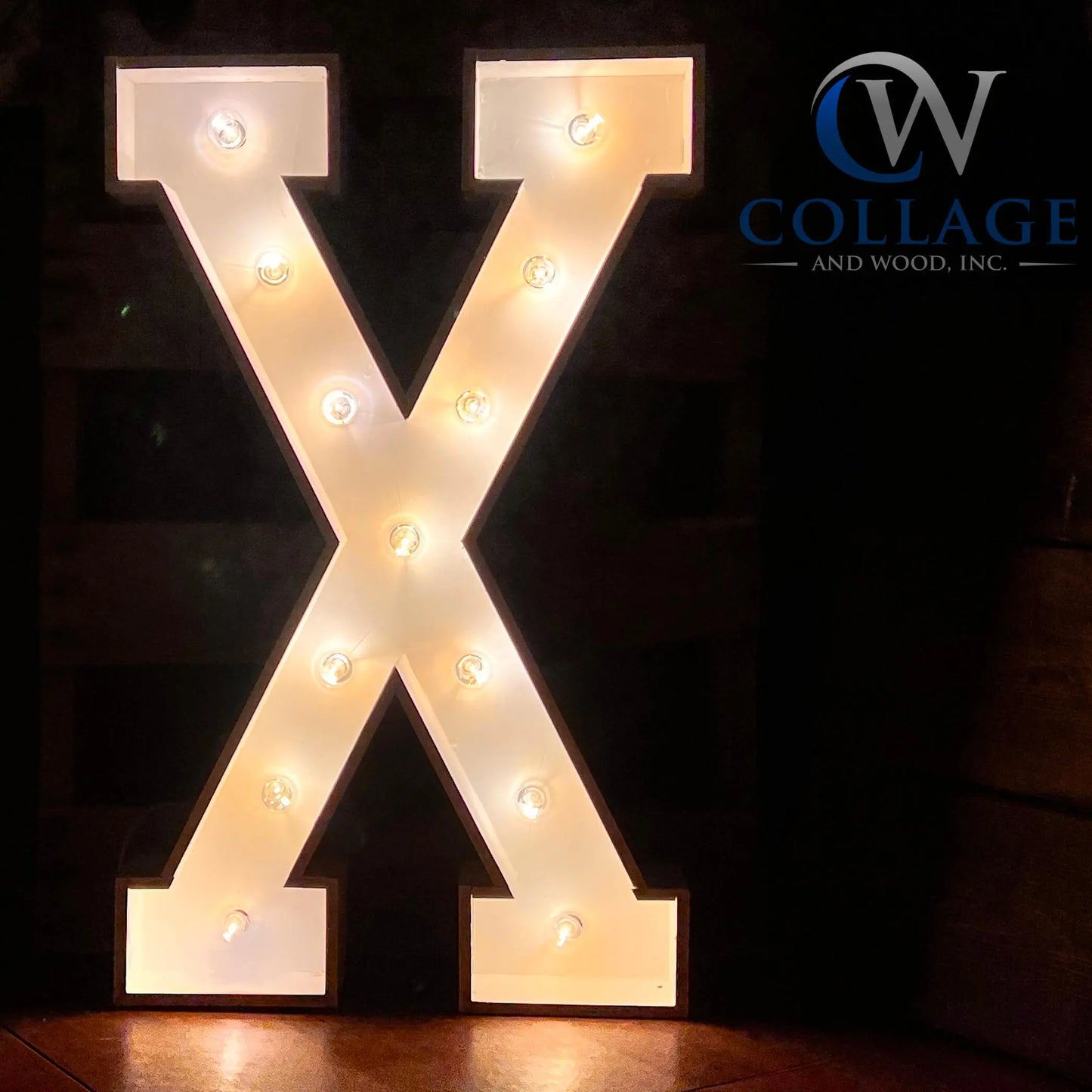 Exemplary wooden marquee letter X, stretching 3 feet tall, finished in a smooth white hue, illuminated by vibrant LED lights.