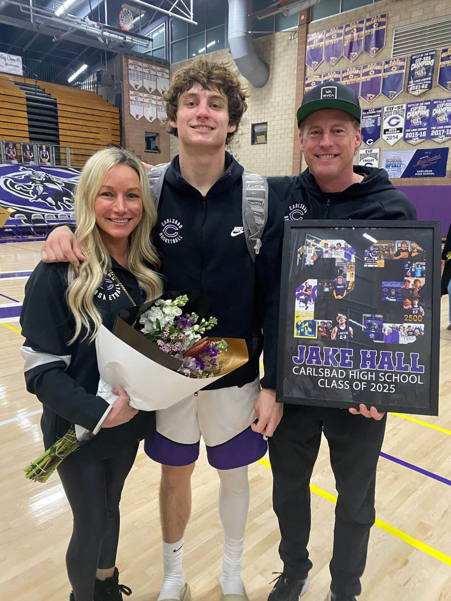 basketball player jake hall with his parents on senior night. His father is holding a custom basketball poster created by collageandwood.com