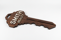 Deep Brown Stain + White Letters. Available at collageandwood.com.