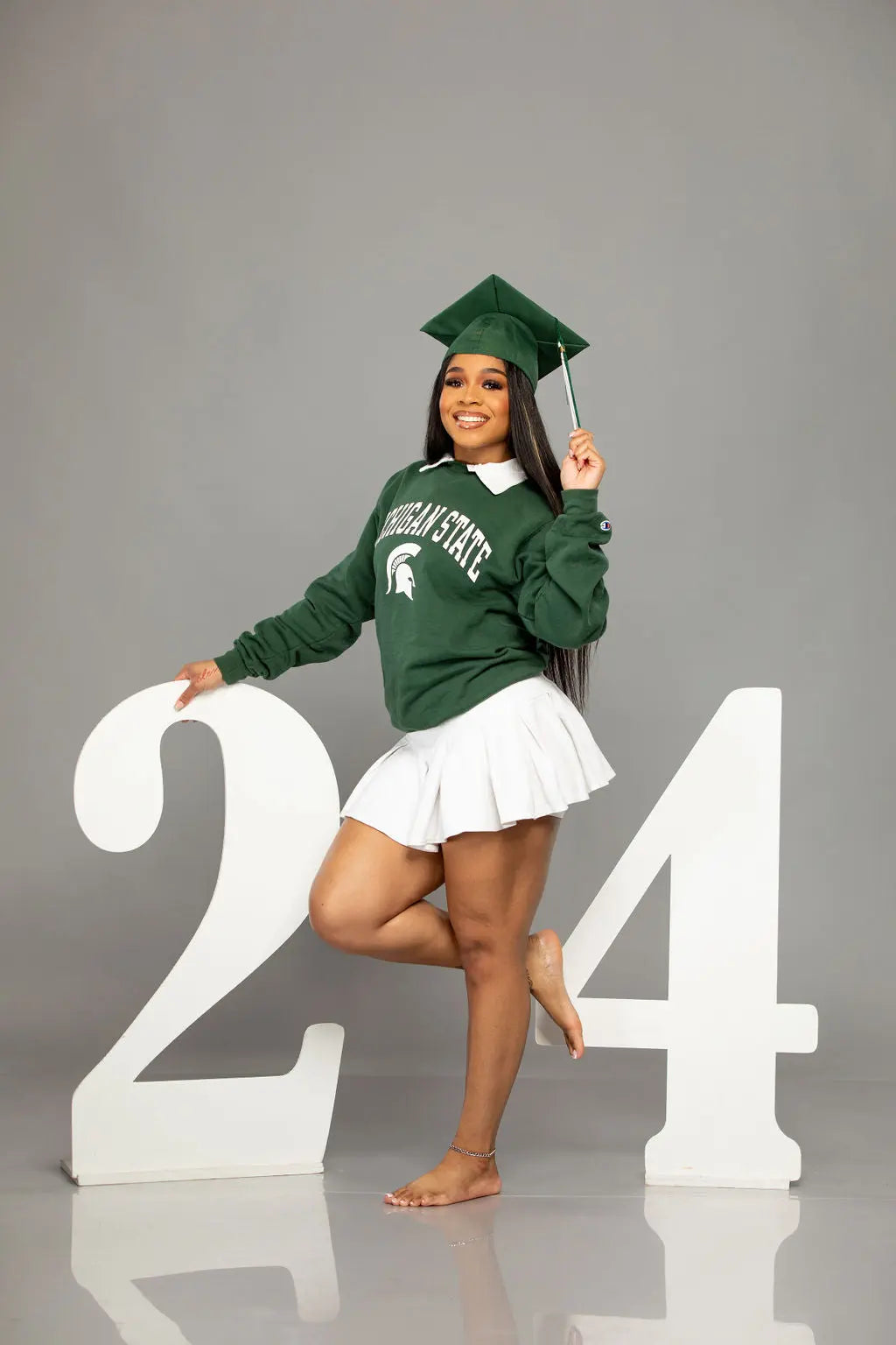 Photography Props for seniors, beautiful senior graduate with giant 24 prop.