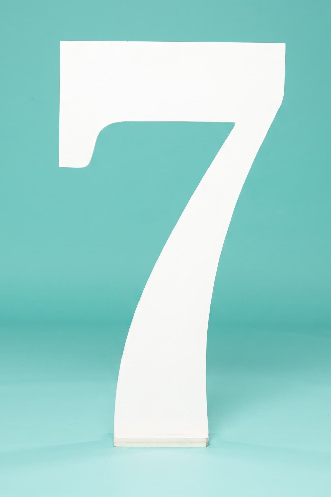 White number '7' freestanding photo prop from collageandwood.com.