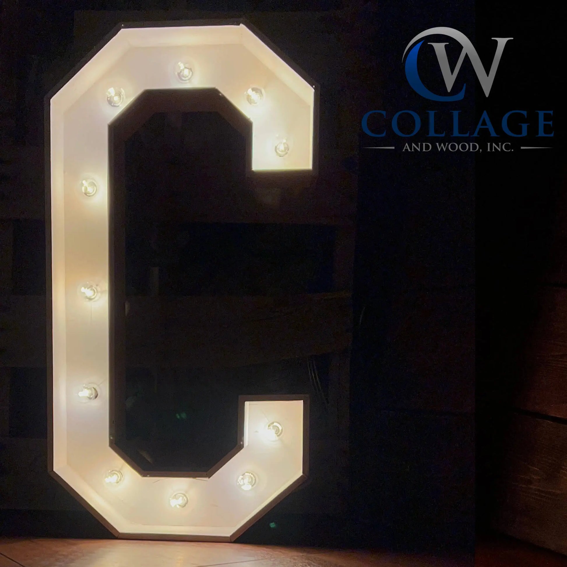 C - Captivating 3-foot tall wooden marquee letter C in classic white, adorned with dazzling battery-powered LED lights.