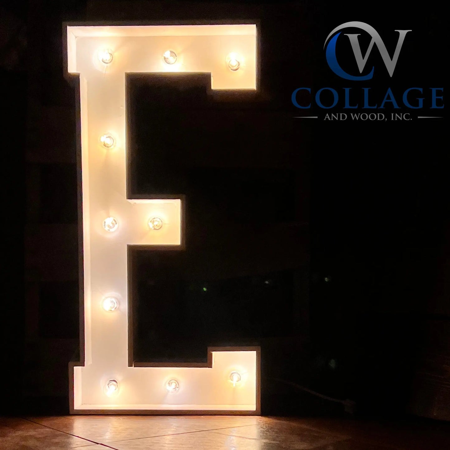E - Exquisite 3-foot tall wooden marquee letter E, finished in a pristine white, featuring vibrant battery-powered LED lights.