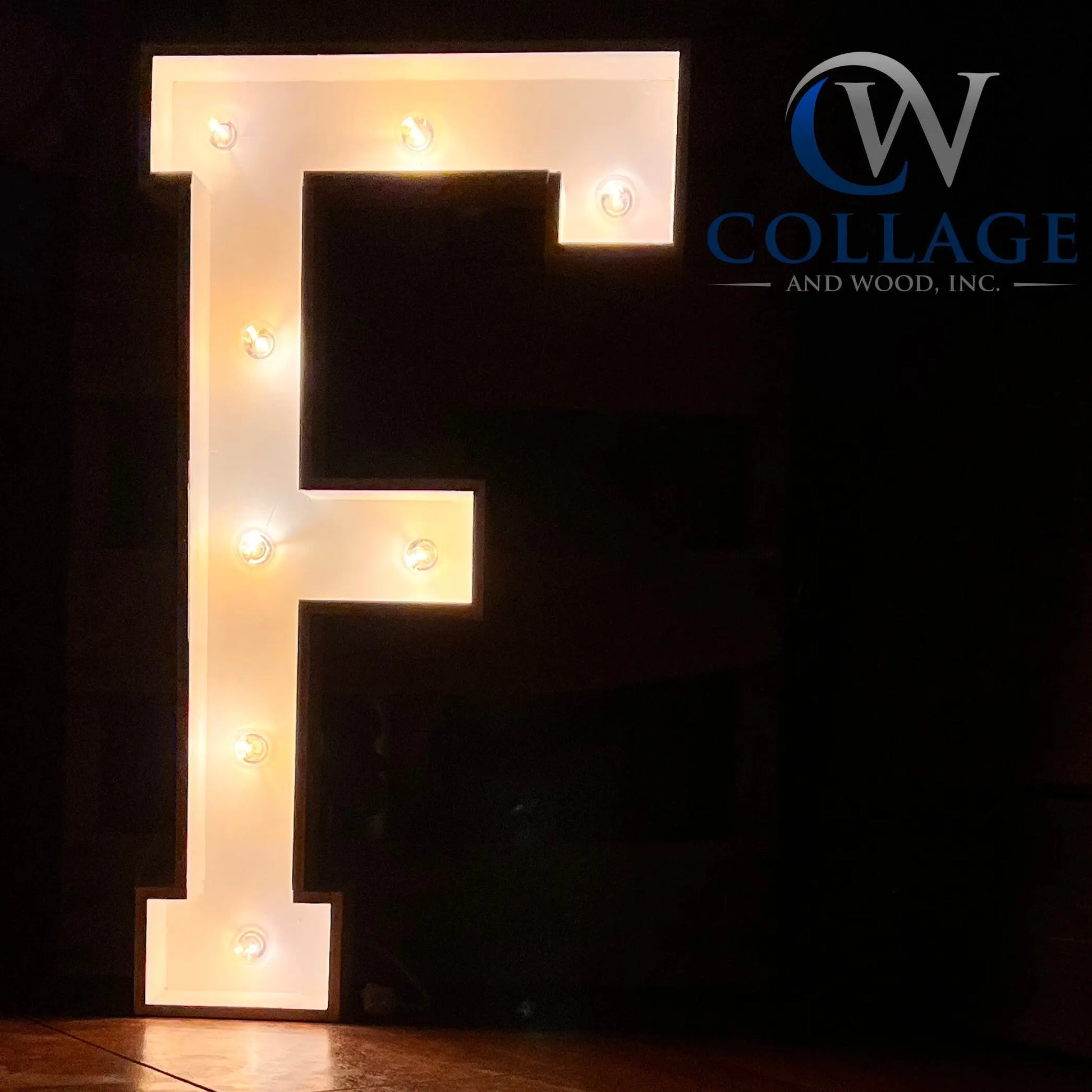 "F - Fantastic wooden marquee letter F, standing 3 feet tall in a polished white finish, lit by brilliant LED lights.