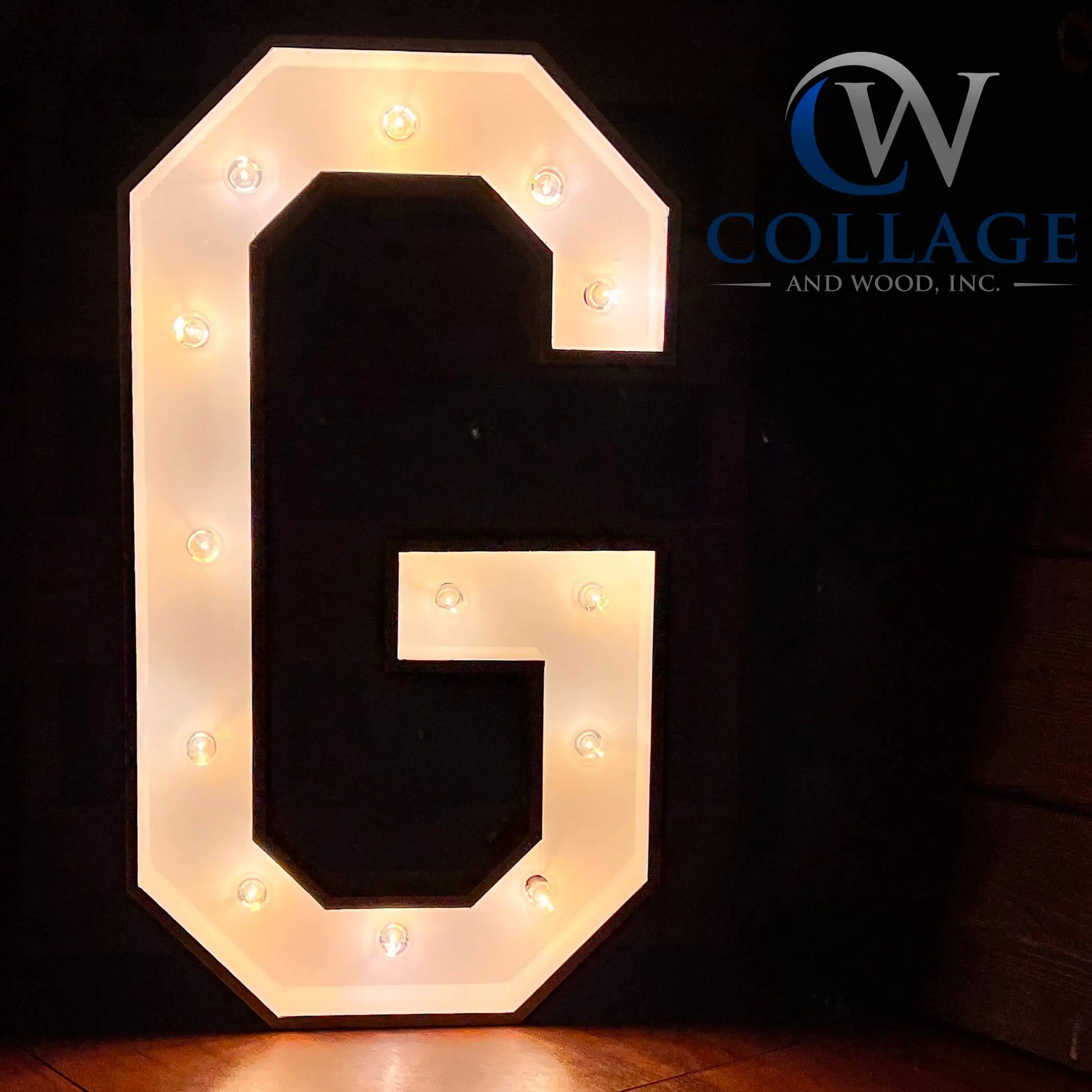 G - Grandiose 3-foot tall wooden marquee letter G, elegantly dressed in white, adorned with sparkling battery-powered LED lights.