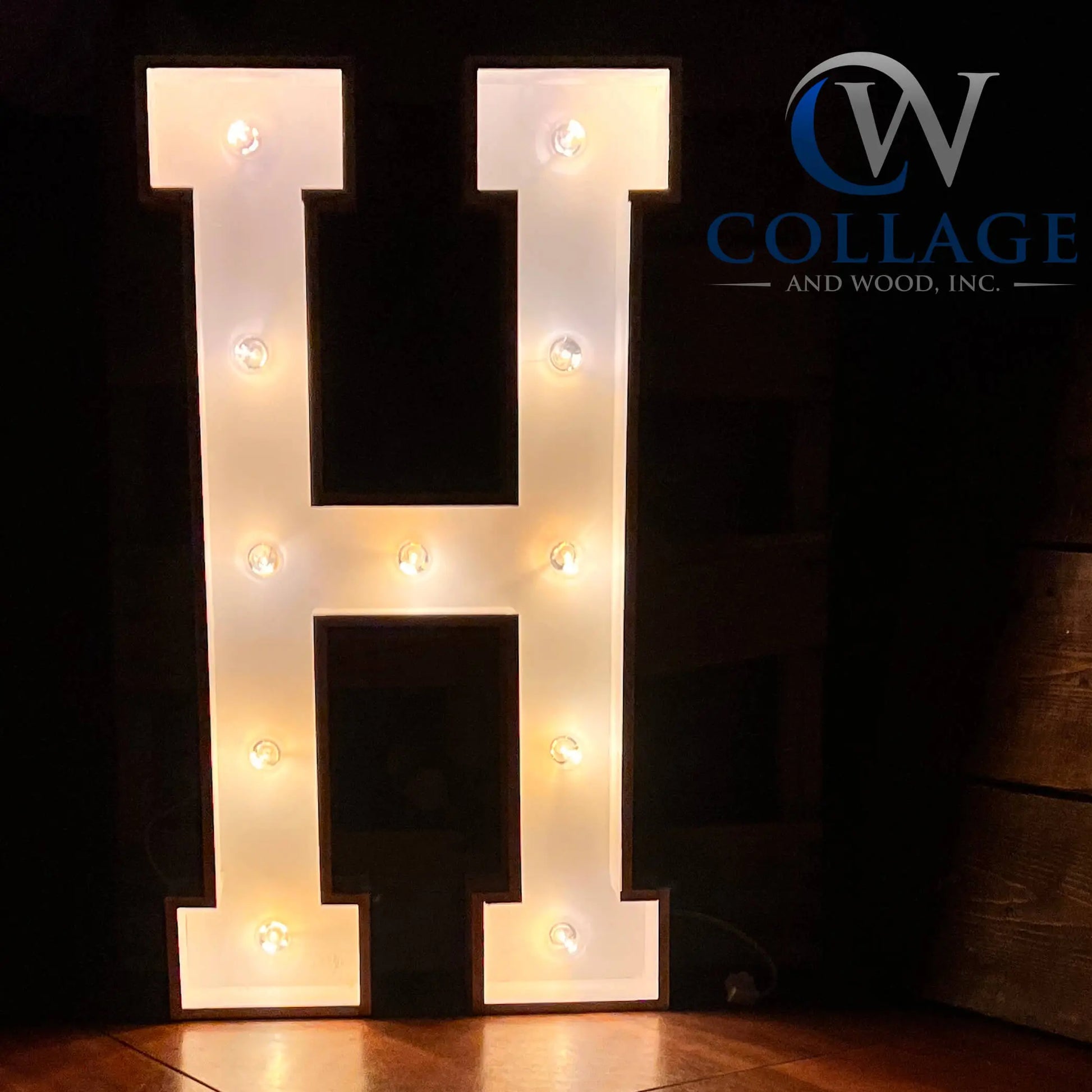 Handsome wooden marquee letter H, measuring an impressive 3 feet tall, in a sophisticated white finish, glowing with LED lights.